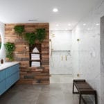 luxury bathroom remodel ideas plant wall wood wall marble shower blue vanity concrete bathroom